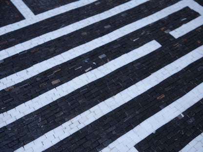 The Nestorian Monument Mosaic Logo